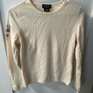 Sutton Studio cashmere sweater with “tattoo” detail